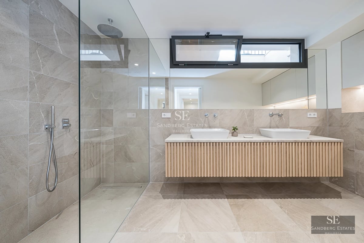 Exterior view of a modern villa with a pool. Minimalist architecture, large windows, and manicured landscaping.