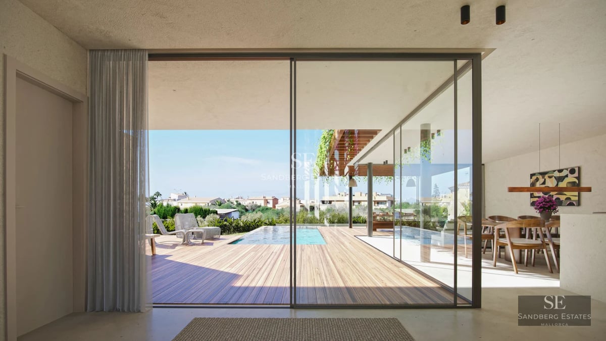 Exterior view of a modern villa with pool, sun loungers, manicured lawn, and minimalist architecture. Natural light and elegant design.