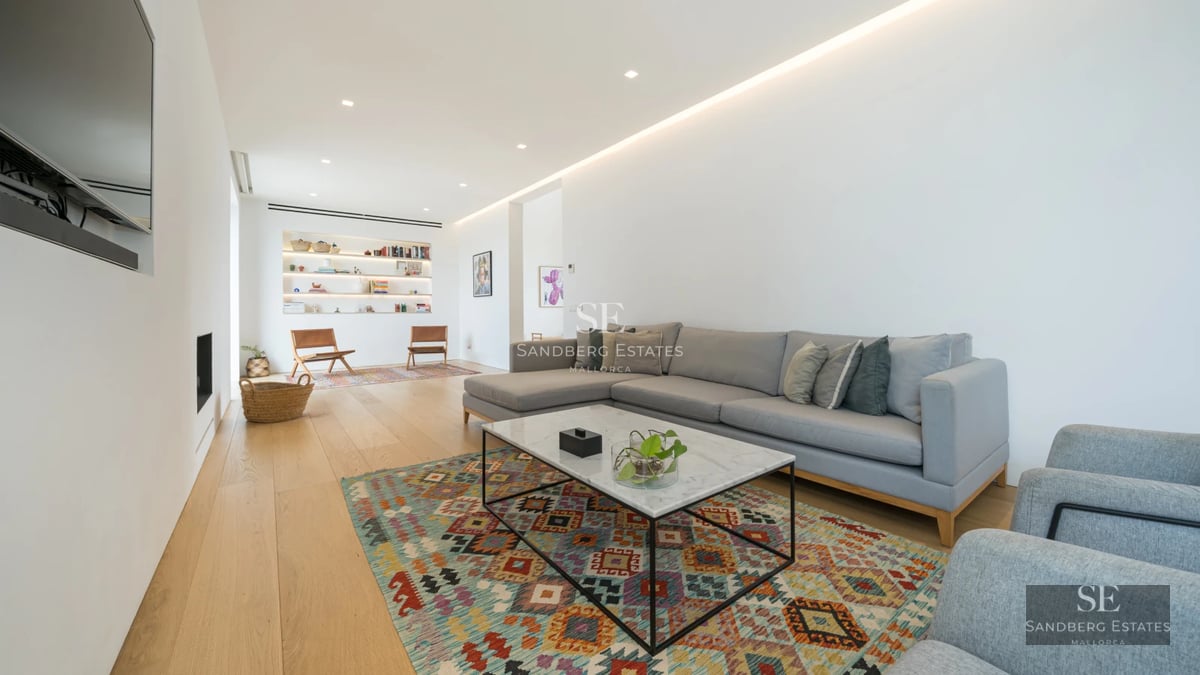 View of luxurious property with pool, manicured lawn, and modern architecture. Green grass and minimalist design.