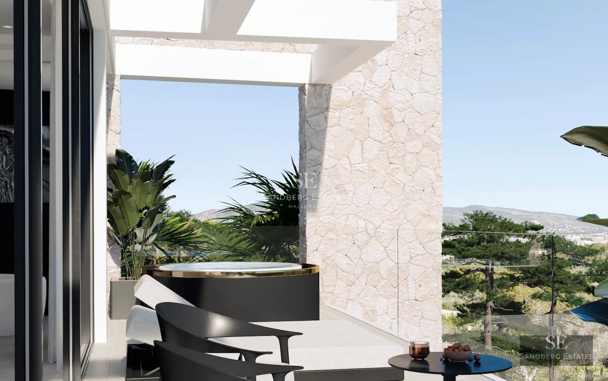 Large infinity pool surrounded by a lush garden and sunny terrace. Modern design with spectacular views.