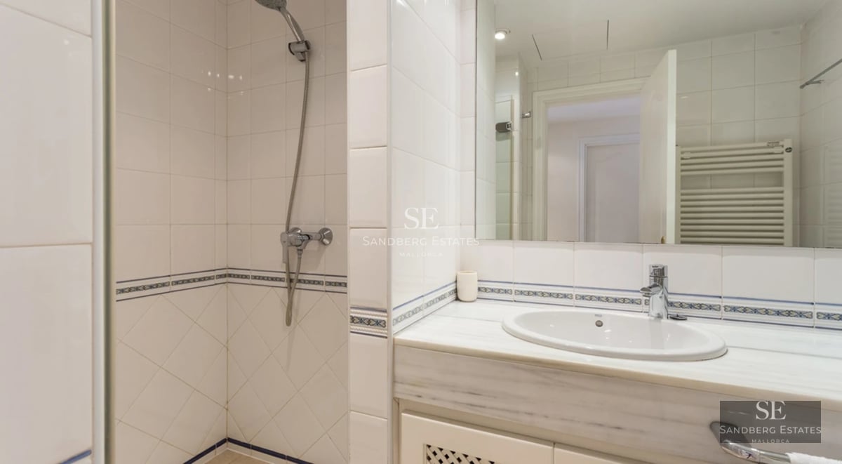 Expansive terrace with infinity pool, panoramic sea views, elegant furniture, and modern architecture. Luxurious outdoor space.