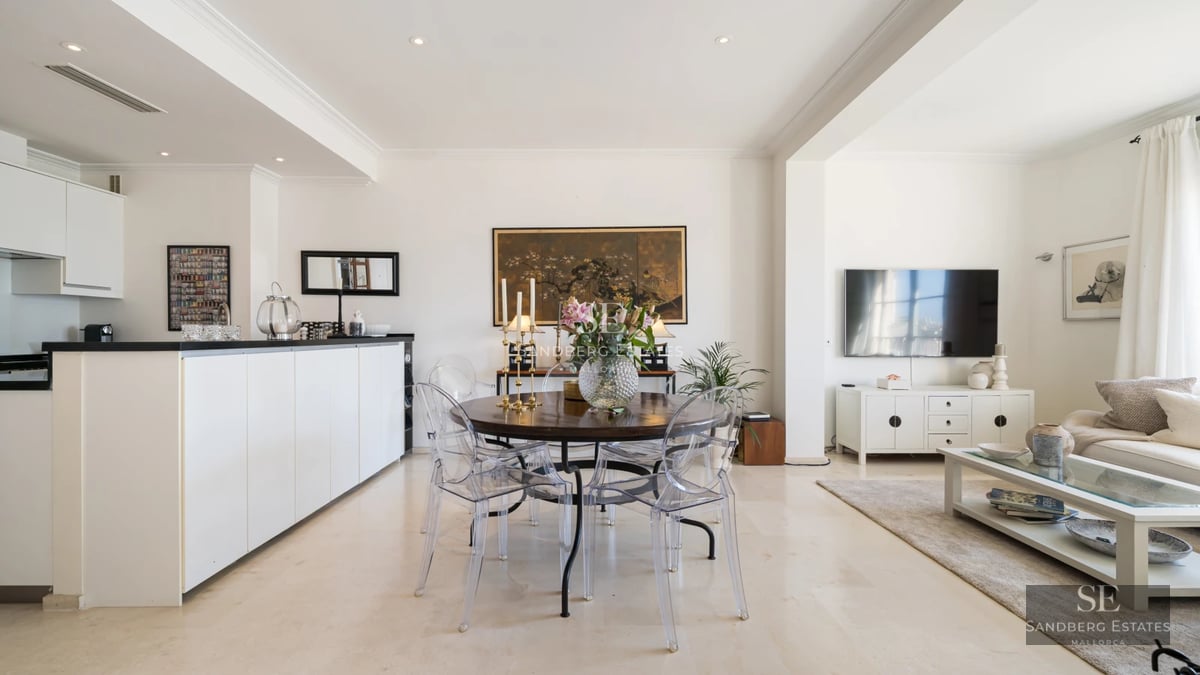 Expansive terrace with infinity pool, sun loungers, panoramic views, and minimalist modern architecture. Elegant and relaxing design.