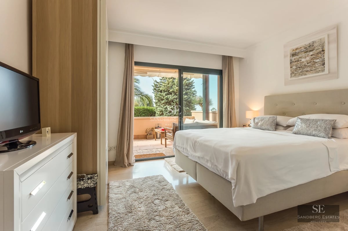 Exterior view of a modern villa with infinity pool, expansive terraces, and lush garden. Minimalist architecture with panoramic windows.