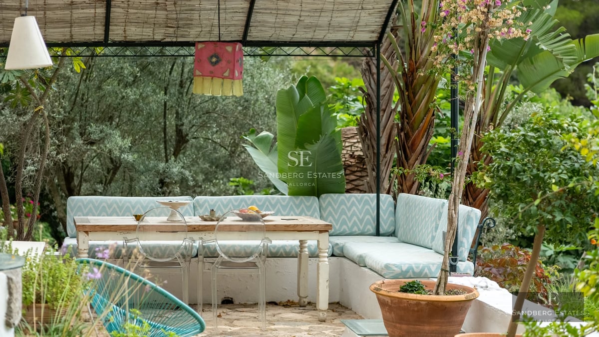 Panoramic view of a modern villa featuring an infinity pool, spacious terrace, and minimalist architecture. Sleek design and abundant natural light.