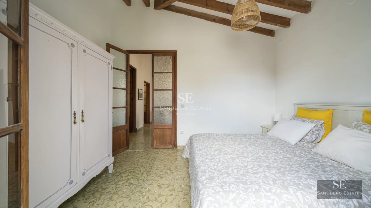 Spacious terrace with infinity pool, sun loungers, and panoramic views. Modern design with glass and wood. Abundant natural light.