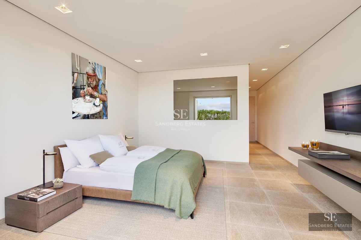 Exterior view of a modern villa with a pool, lush garden, and minimalist architecture. Warm lighting and spacious terraces.