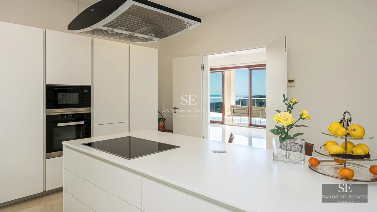 Spacious terrace with swimming pool, modern design, elegant furniture, and panoramic views. Minimalist architecture and high-end finishes.