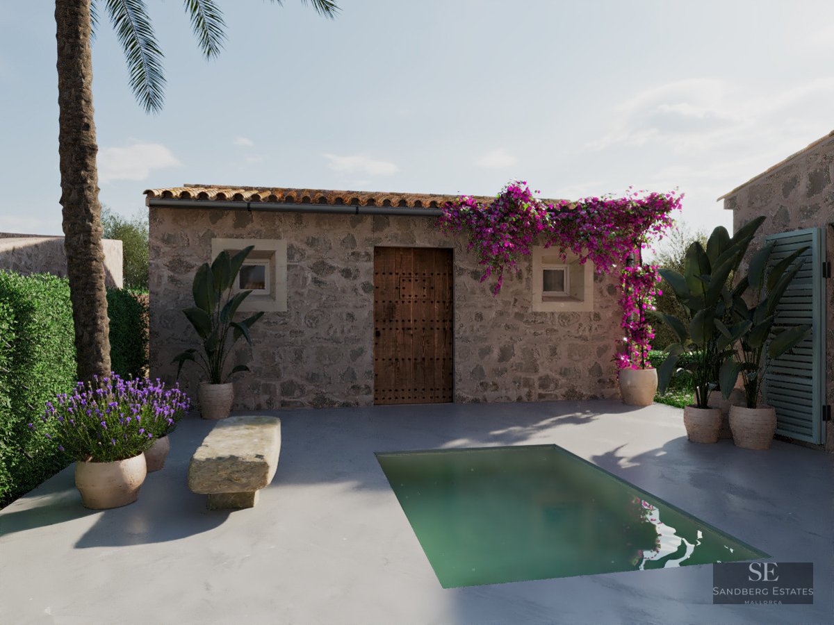 Private stone plunge pool surrounded by lavender and bougainvillea in a rustic Mediterranean courtyard.