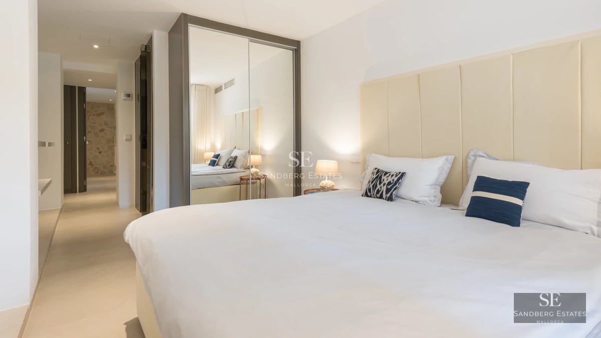 Spacious terrace with infinity pool, sun loungers, and panoramic views. Modern architecture with clean lines and elegant finishes.