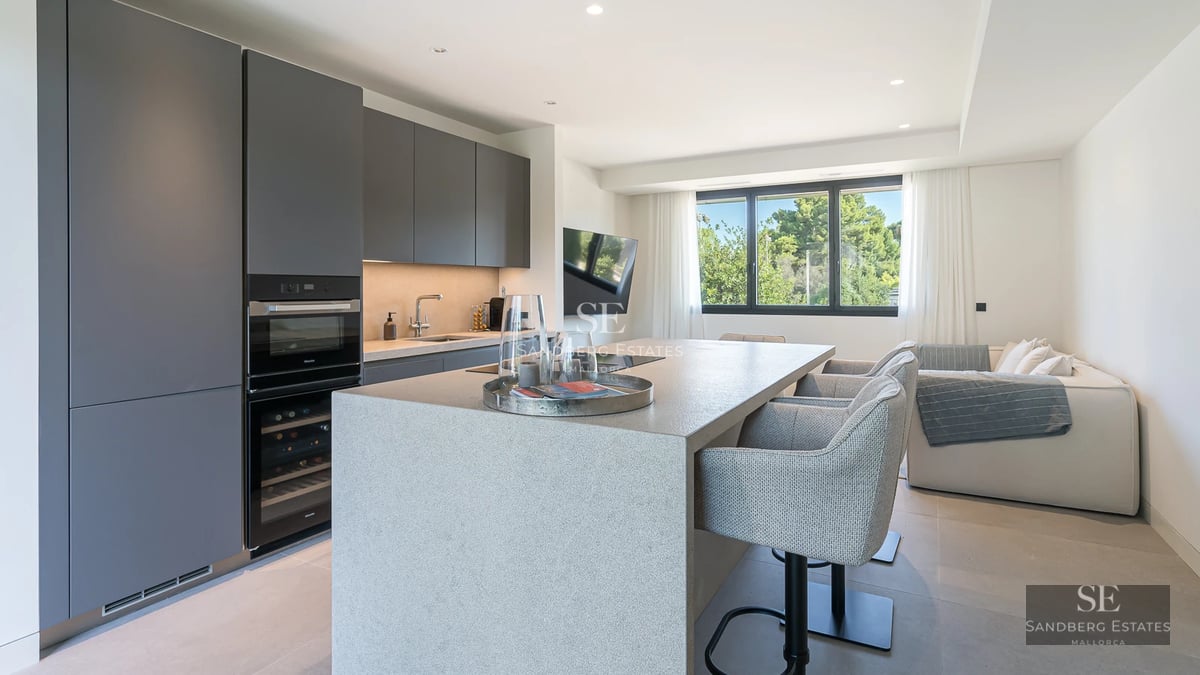 Exterior view of a modern villa featuring an infinity pool, expansive terraces, lush garden, and minimalist architecture. Luxury and design.