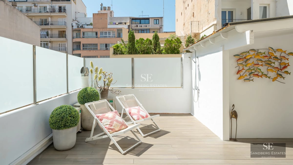 Expansive terrace with infinity pool, sun loungers, and spectacular views. Modern, minimalist design with high-quality materials.