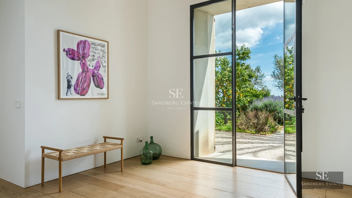 Image of a modern villa featuring an infinity pool, lush garden, and expansive terraces. Minimalist architecture with floor-to-ceiling windows and sleek design.