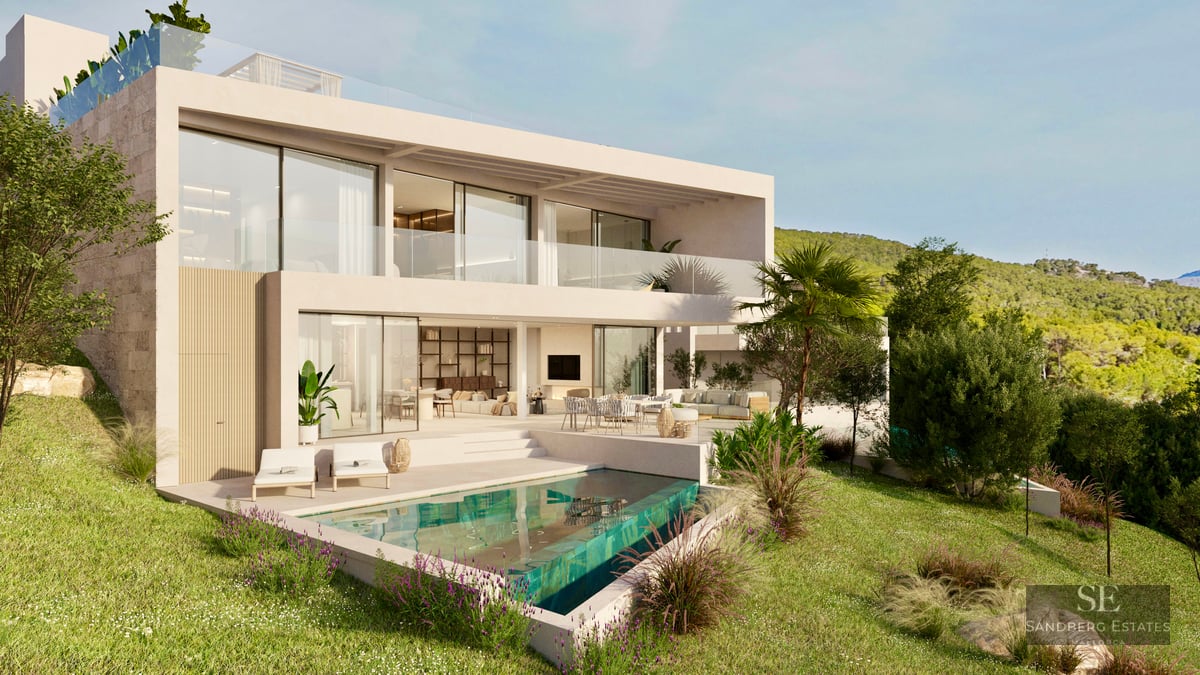 Modern two-story villa featuring a turquoise pool, glass balconies, and lush hillside gardens under a clear sky.
