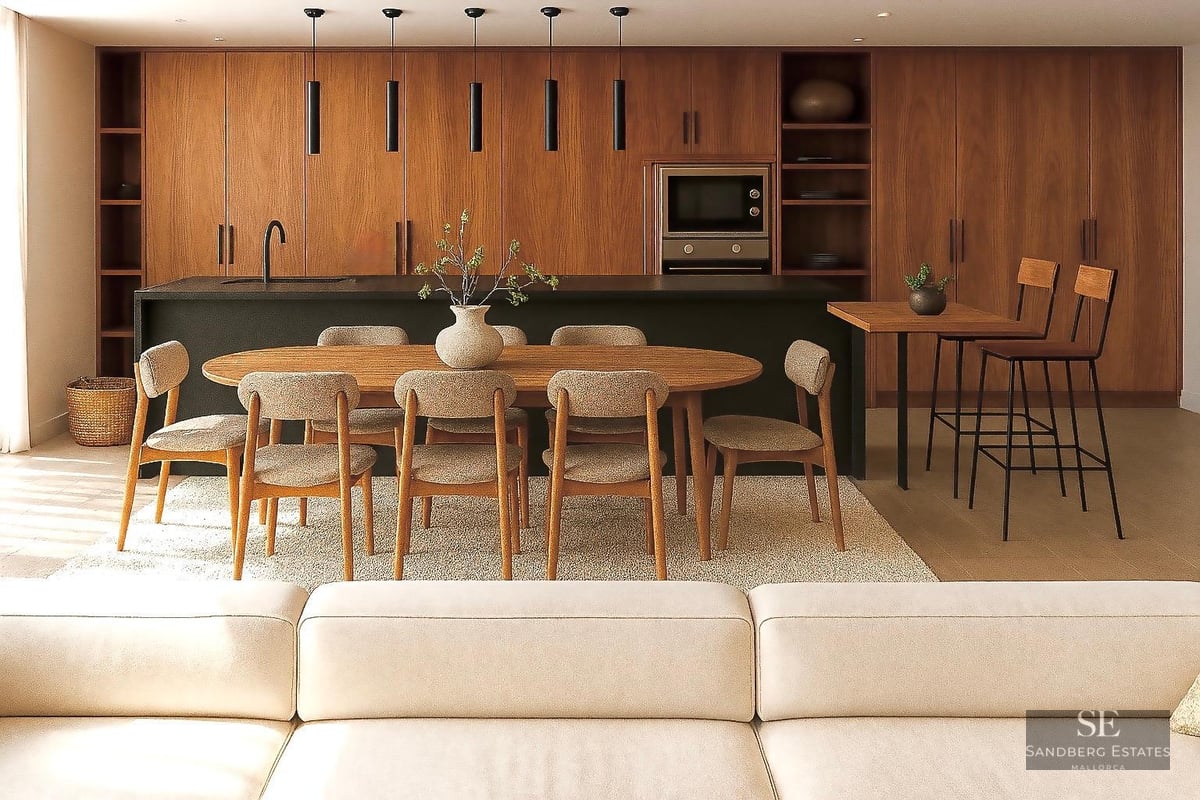 Elegant dining area with a wooden oval table and upholstered chairs set against a modern kitchen with wood cabinetry.