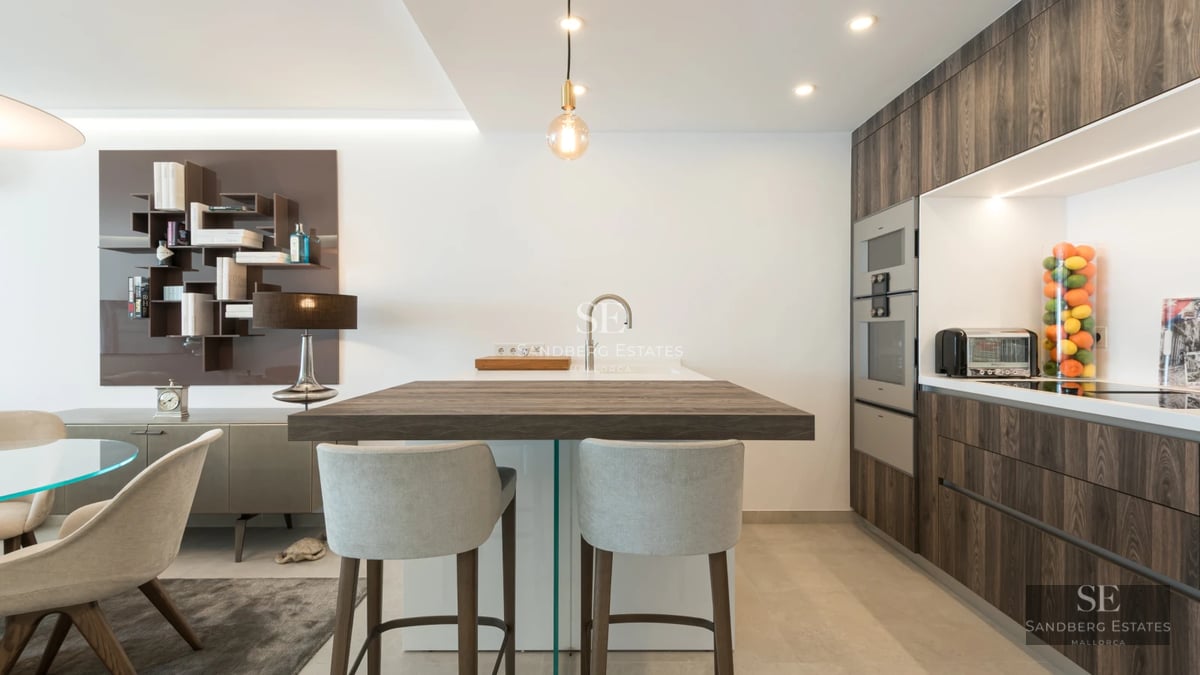 Exterior view of a modern home with a pool. Minimalist architecture, large windows and manicured landscaping. Abundant natural light.