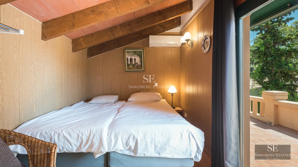 Exterior view of a modern villa with swimming pool, surrounded by lush vegetation. Minimalist and elegant architectural design.