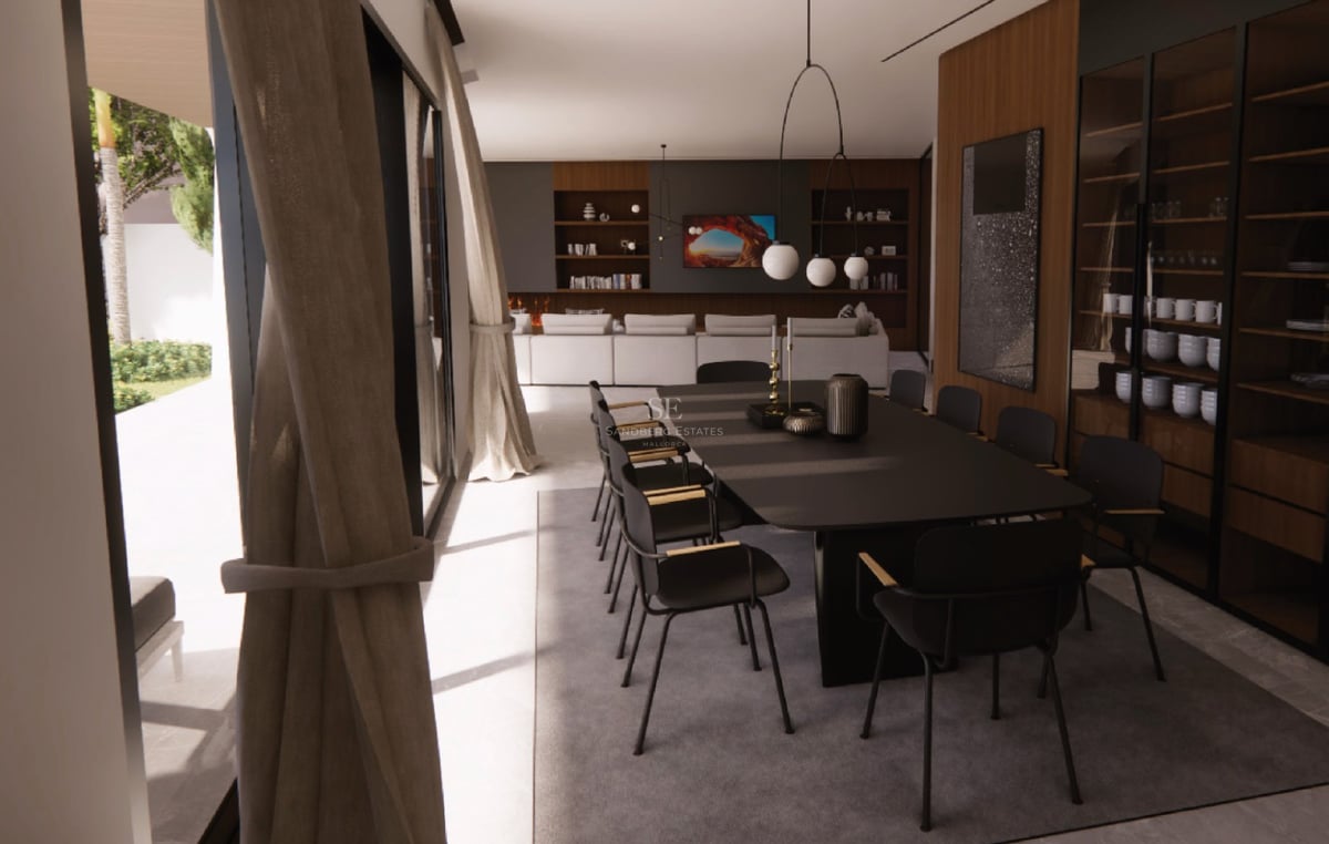 Une table à manger noire élégante entourée de huit chaises dans une pièce lumineuse avec de grandes baies vitrées.