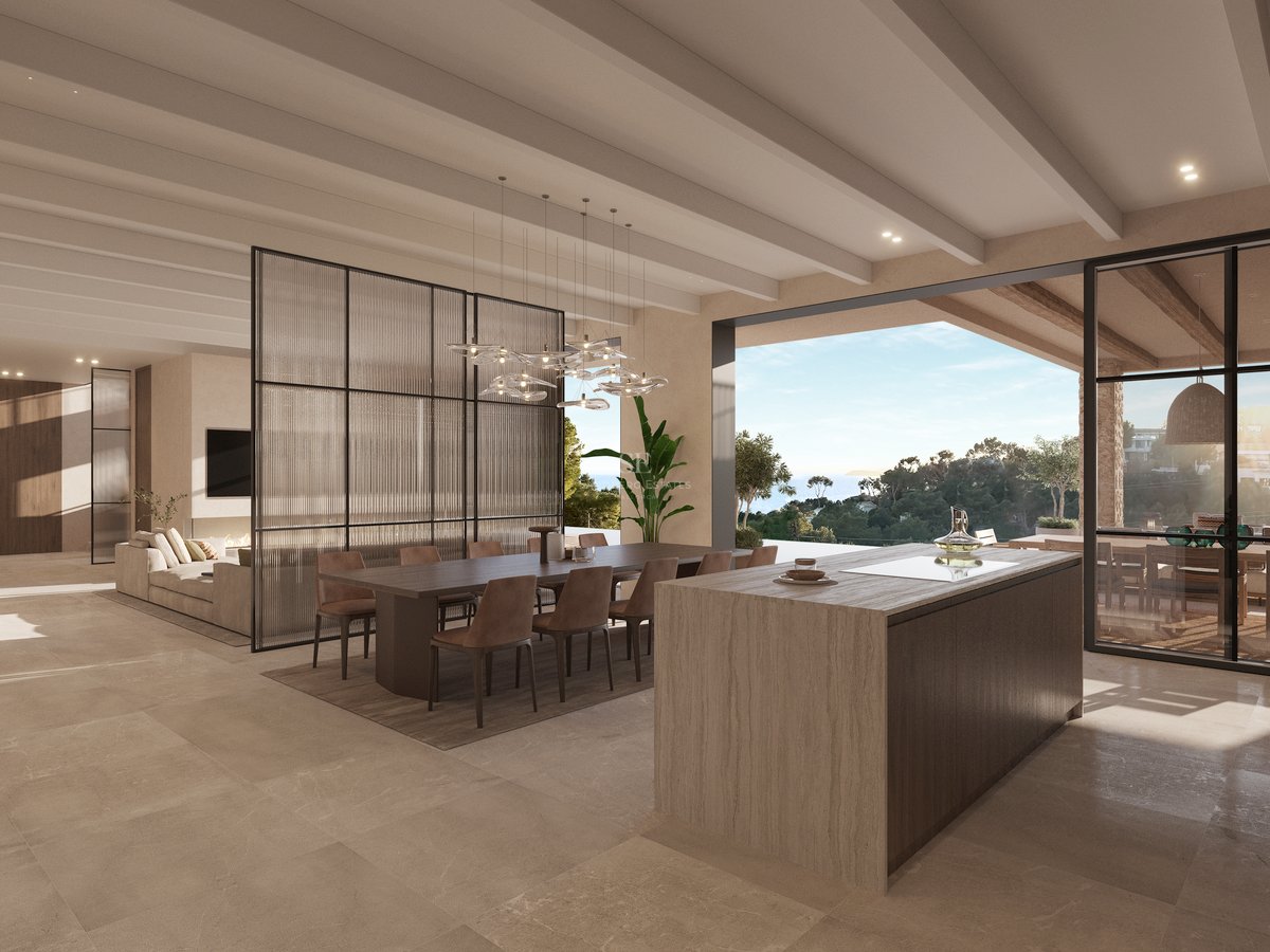 Salle à manger et cuisine moderne avec poutres en bois et baies vitrées offrant une vue sur la côte.