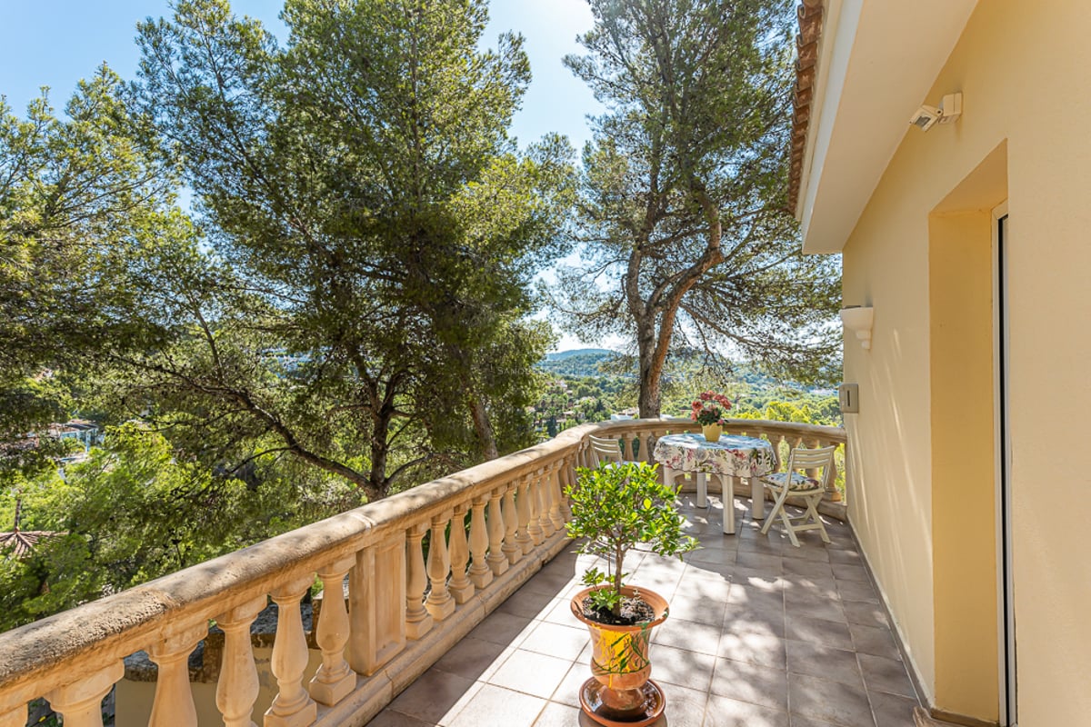 Expansive terrace featuring an infinity pool, panoramic views, stylish outdoor furniture, and minimalist design. Natural lighting and high-end materials.