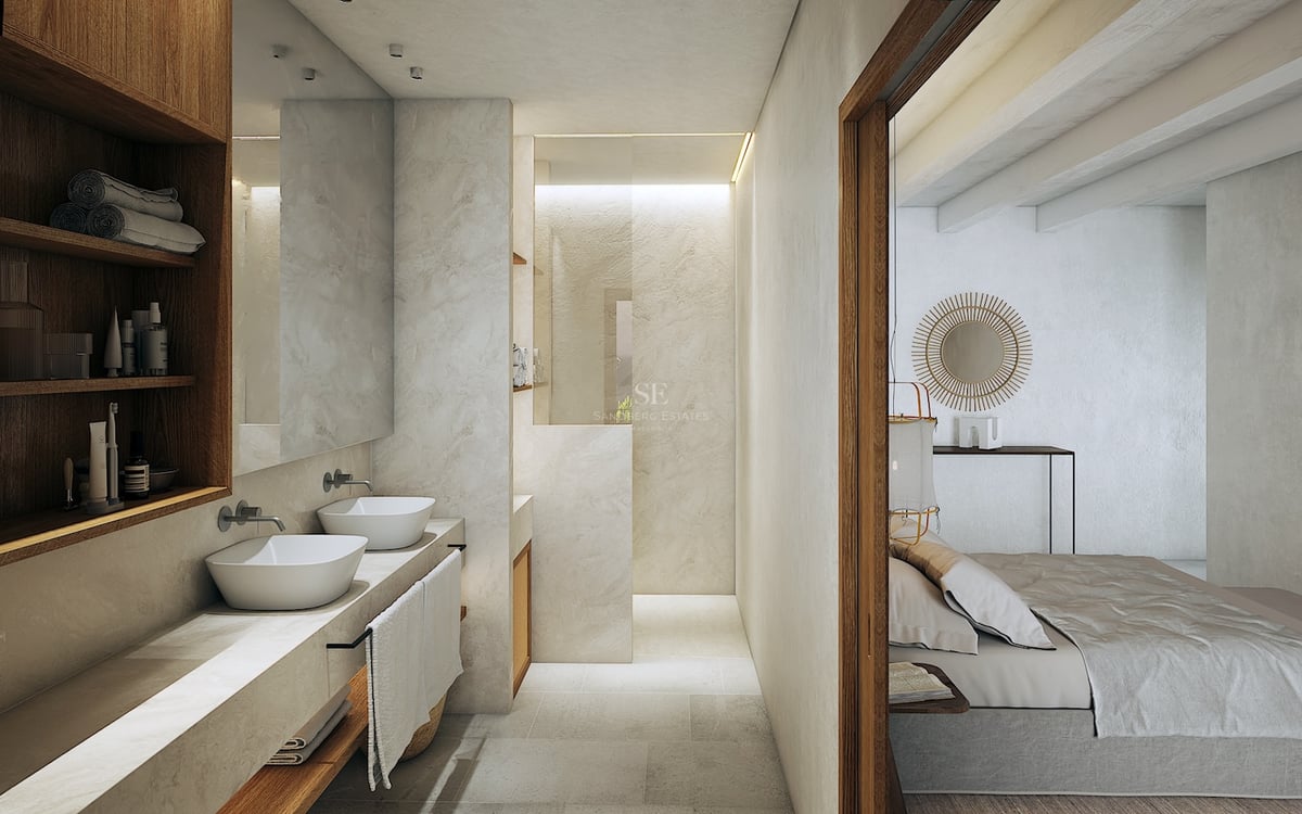 Salle de bains minimaliste avec double vasque sur plan en pierre, étagères en chêne et douche à l'italienne.