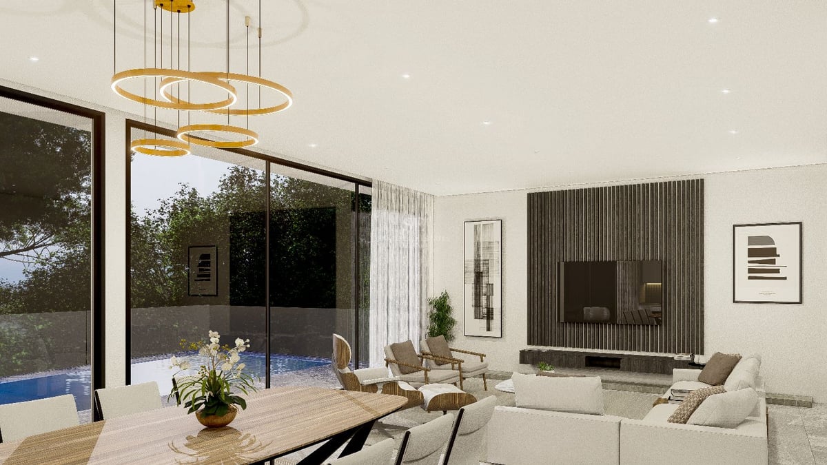 Salon contemporain avec baies vitrées, table à manger en bois et vue directe sur la piscine.