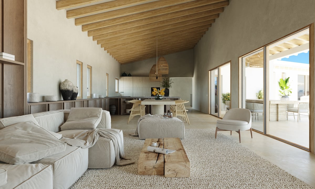 Salon moderne spacieux avec hauts plafonds en bois, mobilier neutre et grandes baies vitrées donnant sur la terrasse.