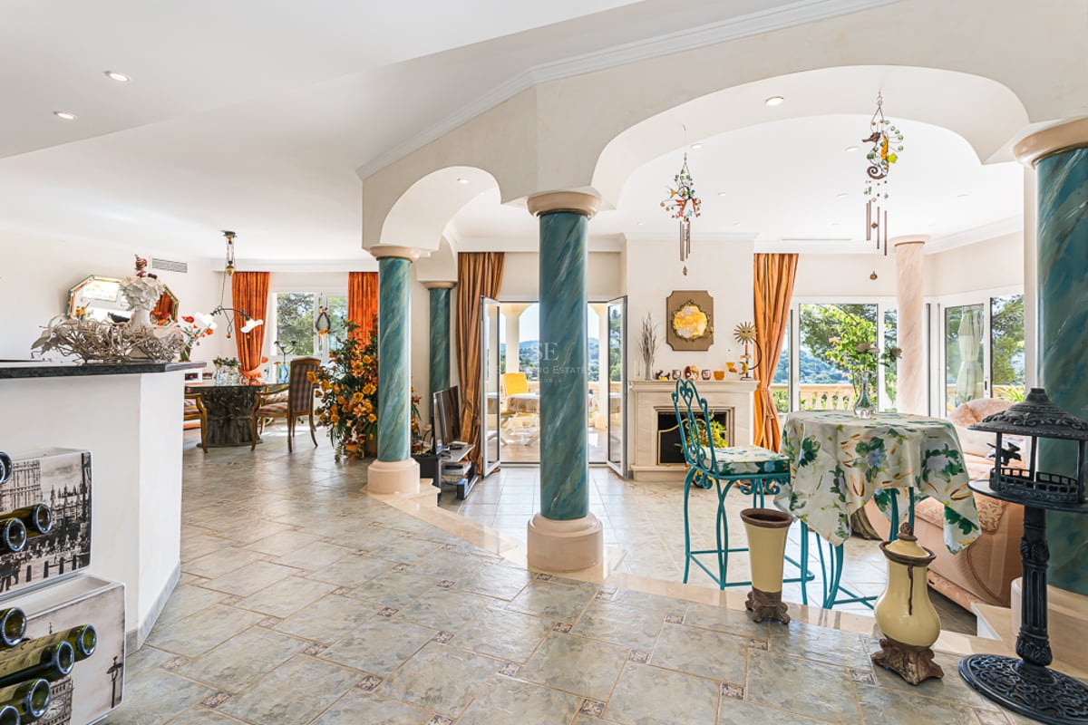 Spacious terrace with infinity pool, sun loungers, and panoramic views. Modern design featuring ambient lighting and high-quality materials.