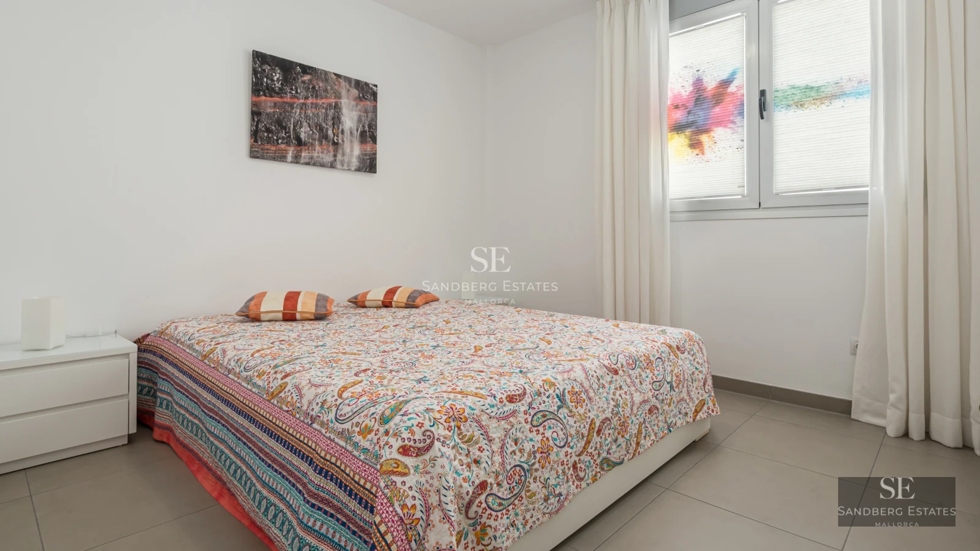 Exterior view of a modern villa with a pool, lush garden, and minimalist architecture. Warm lighting at sunset.