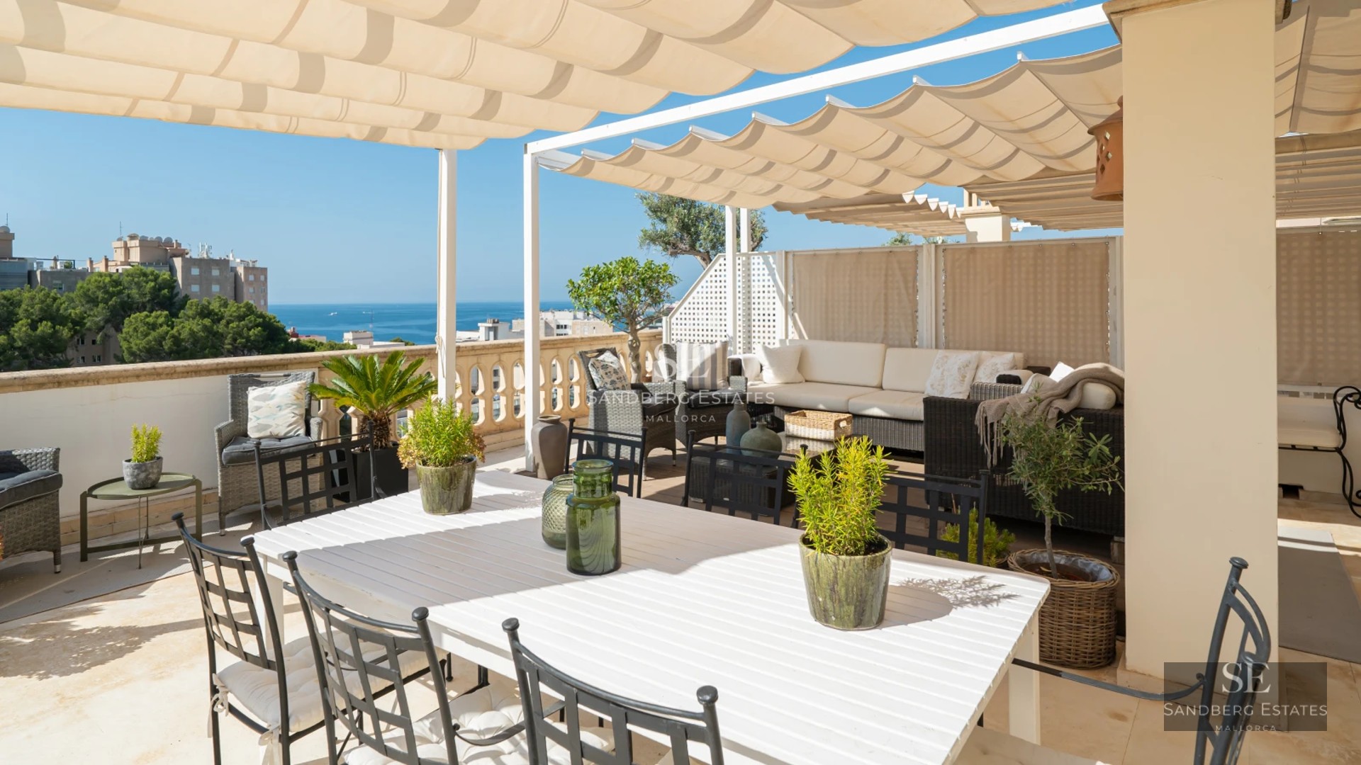 Image of a modern villa featuring an infinity pool, spacious terraces, sun loungers, and panoramic views. Minimalist architecture and elegant design.