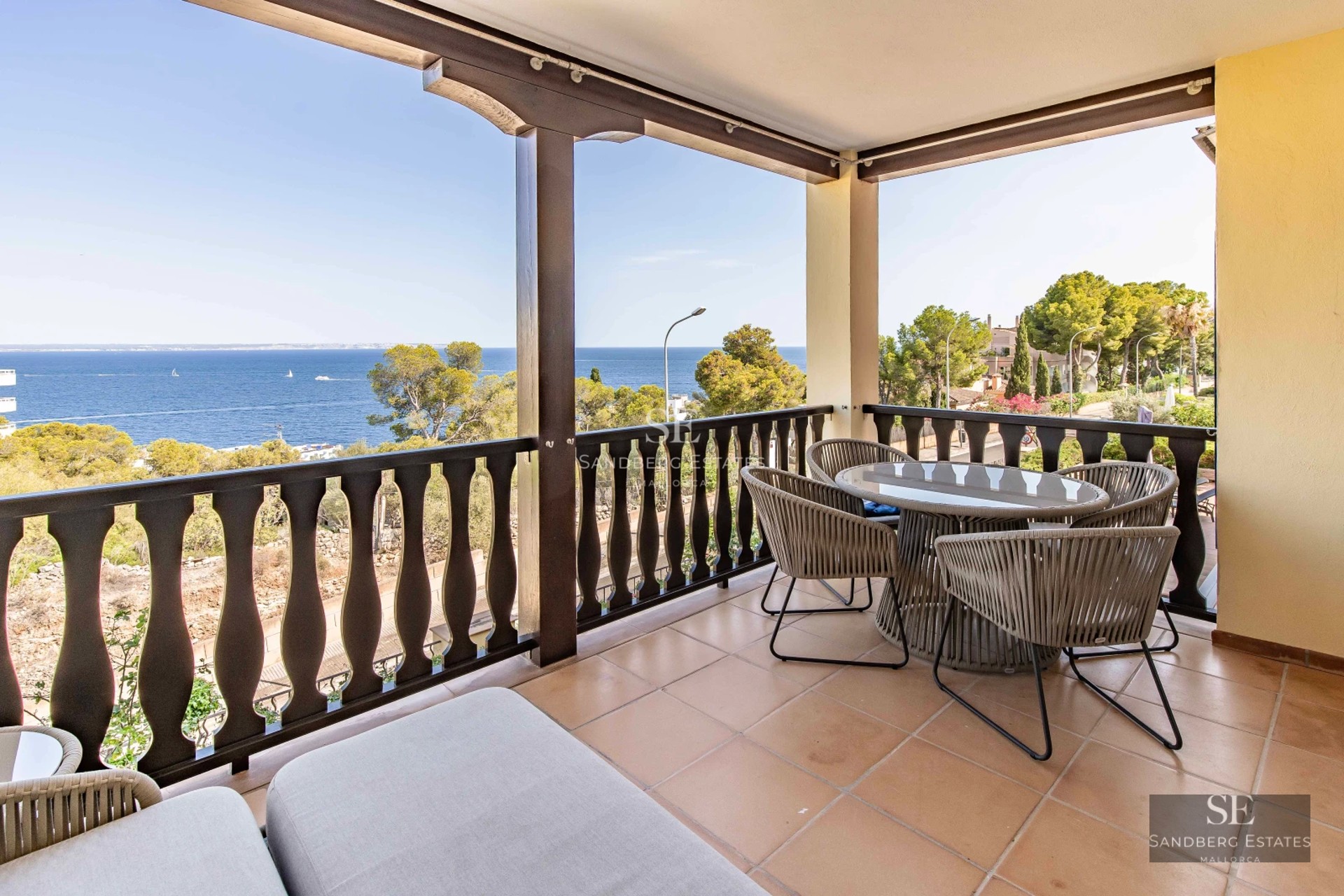 Modern apartment with balcony and sea view. Minimalist design, elegant furniture and abundant natural light.