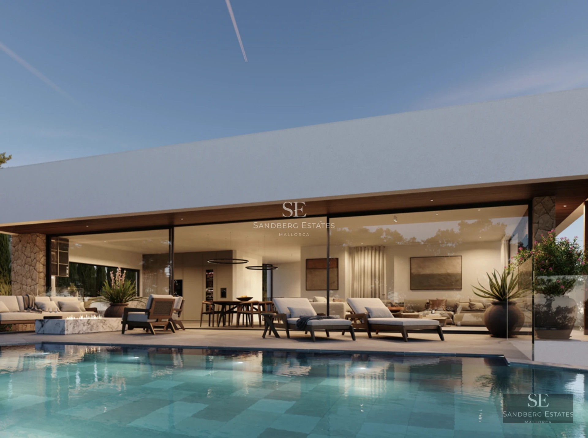 Spacious living room featuring large windows, designer sofas, modern coffee table and access to a terrace with a pool.