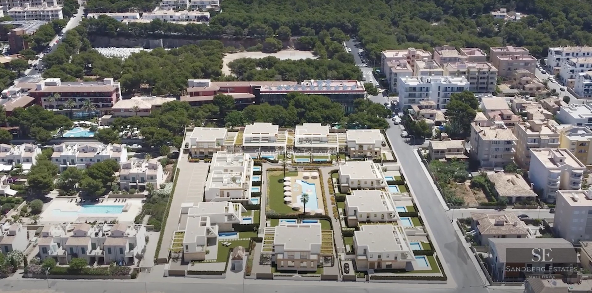 Exterior view of a modern villa with a pool, large windows, minimalist design, and lush garden. Warm ambient lighting.