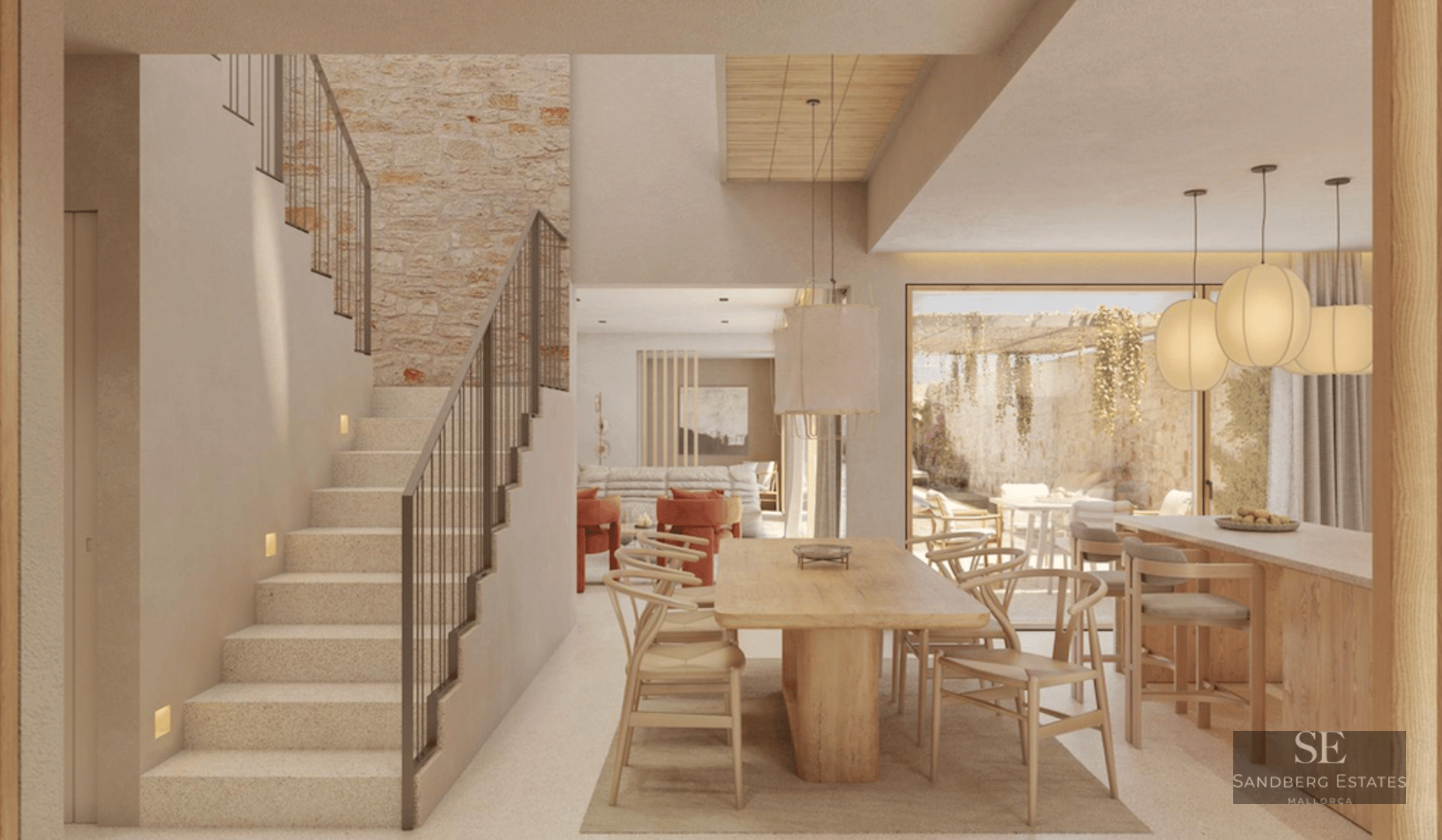 Bright modern interior featuring a large wooden dining table, stone feature wall, and an elegant stone staircase.