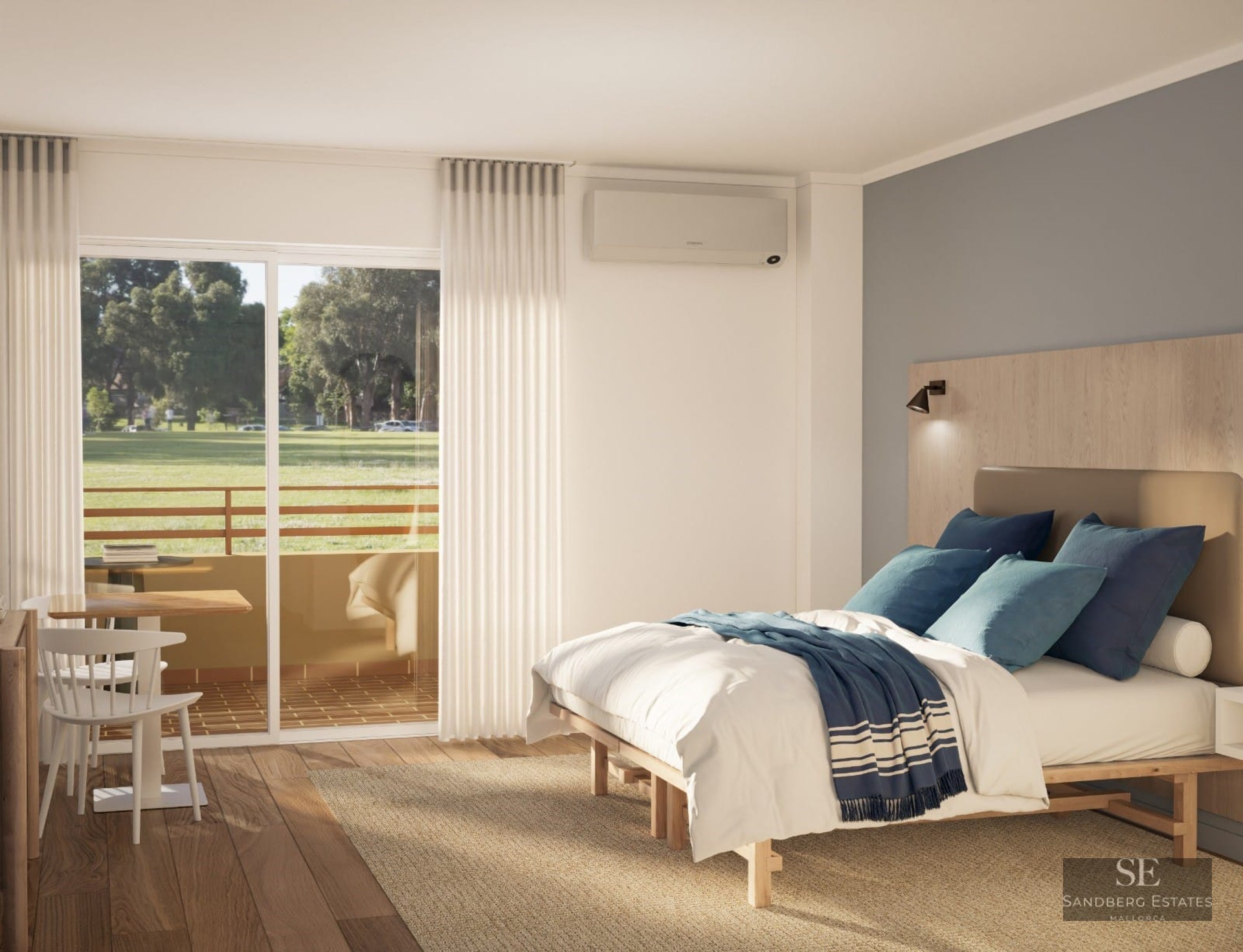 Bright bedroom featuring a wooden bed, blue textiles, and balcony access with views of a green park.