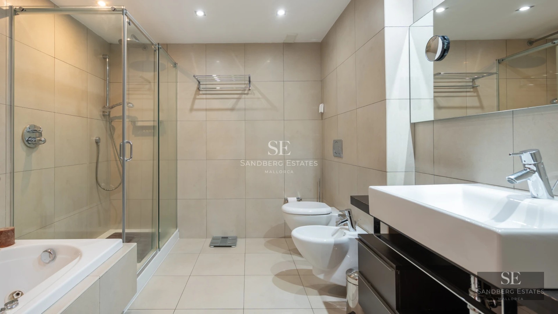 Exterior view of a luxury villa with infinity pool, surrounded by greenery. Modern architecture and spacious terraces.