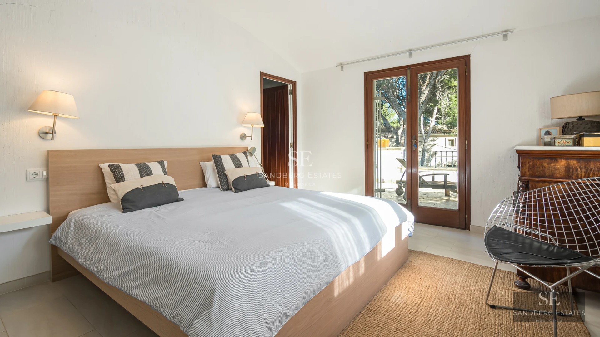 Exterior view of a luxurious villa with pool, terrace, and garden. Modern design and large windows.