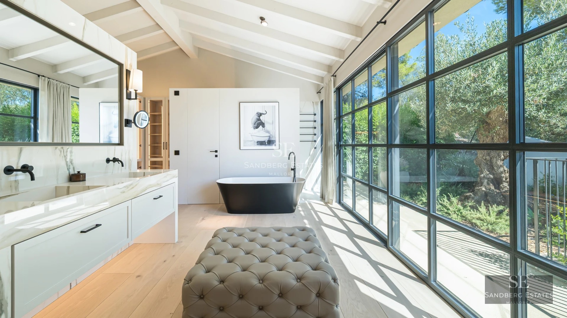 Exterior of a luxury villa with an infinity pool, sun loungers, and panoramic views. Modern design with large windows and a terrace.