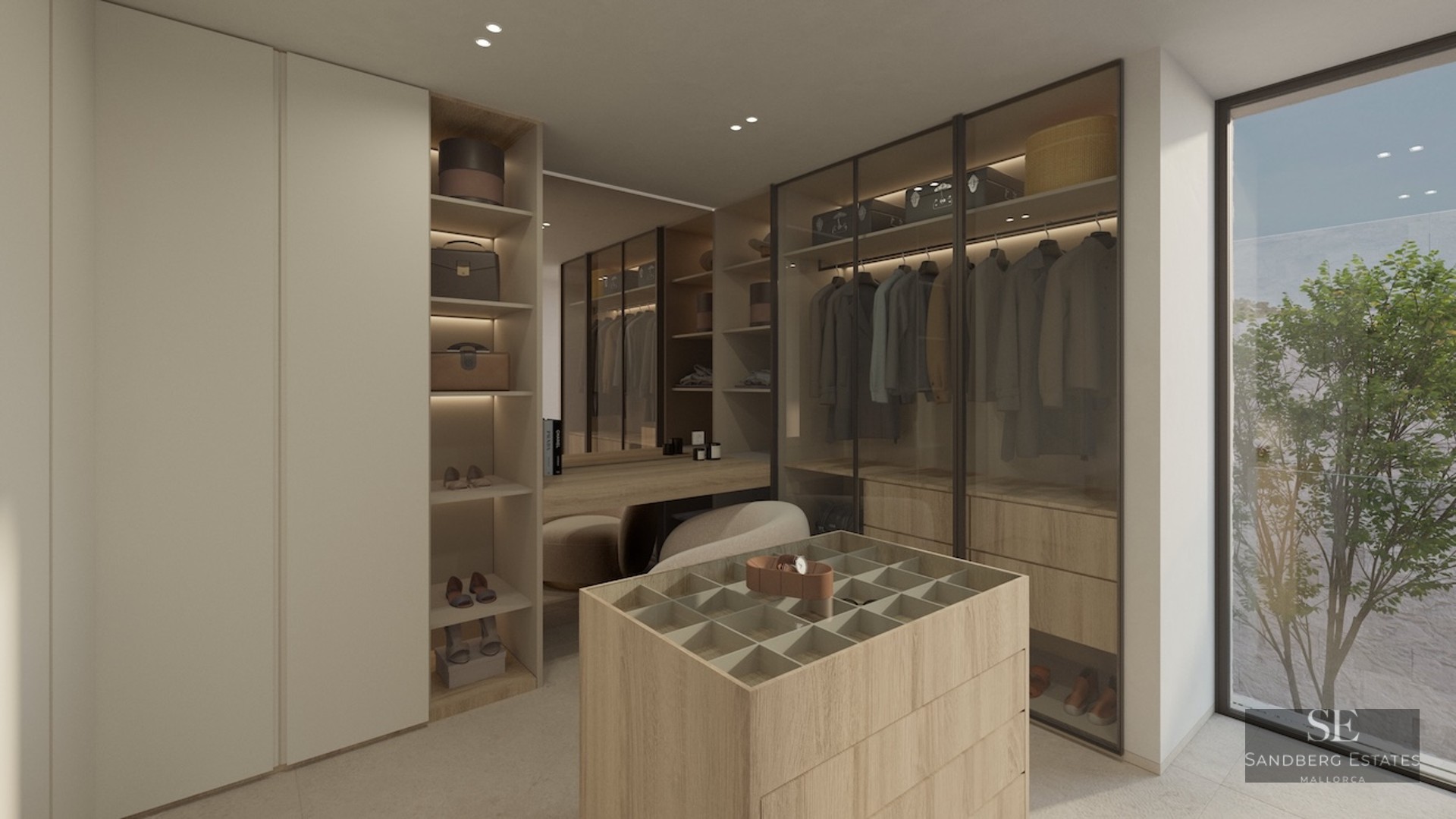 A minimalist walk-in closet featuring light wood cabinetry, glass wardrobes, a central accessory island, and natural light.