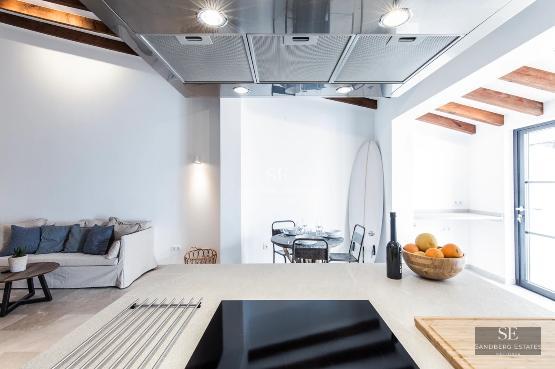 Spacious living room with picture windows, stunning sea views, modern and elegant design, abundant natural light.