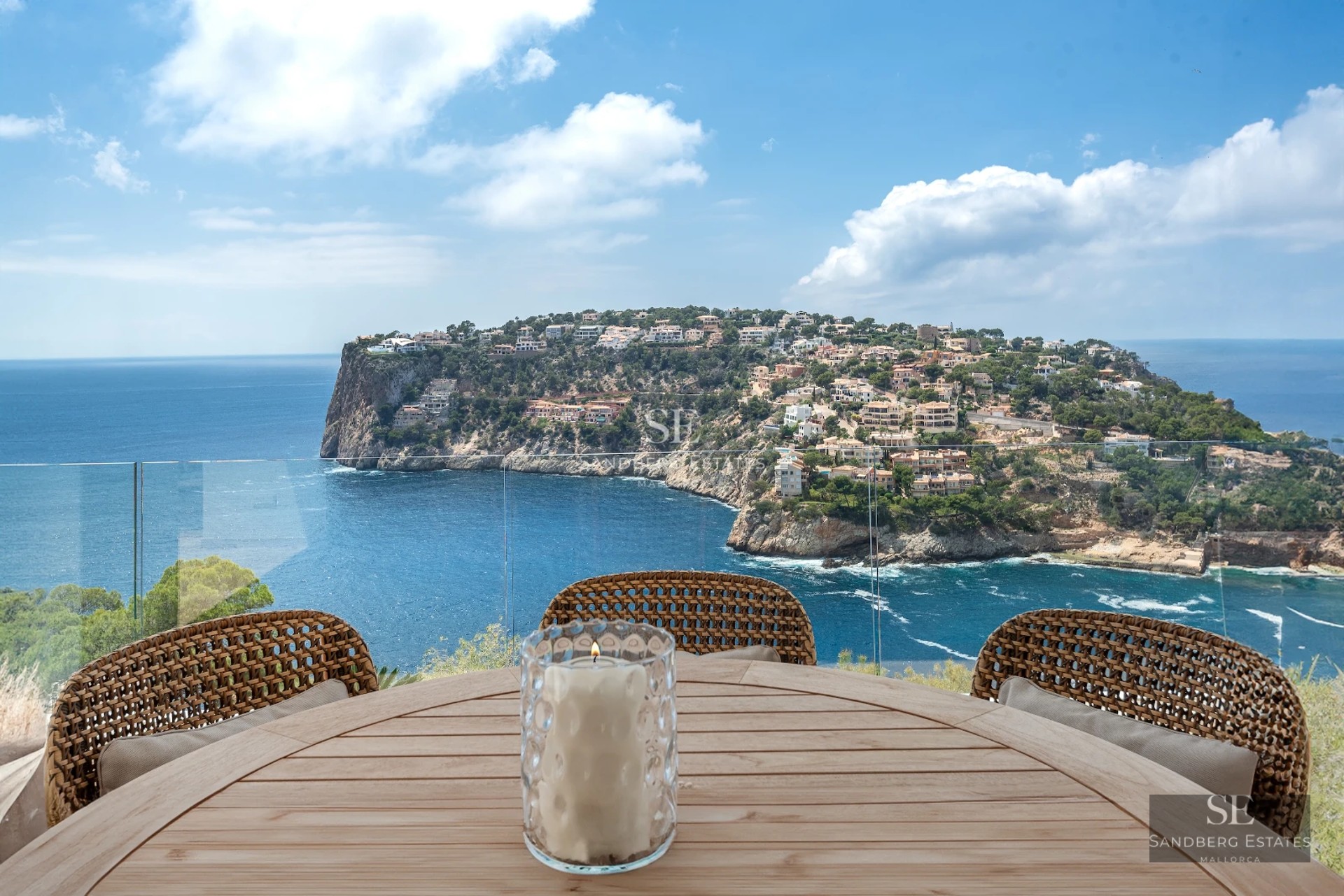 Exterior view of a modern villa with a pool, landscaped garden, and spacious terraces. Contemporary architecture featuring clean lines and large windows.