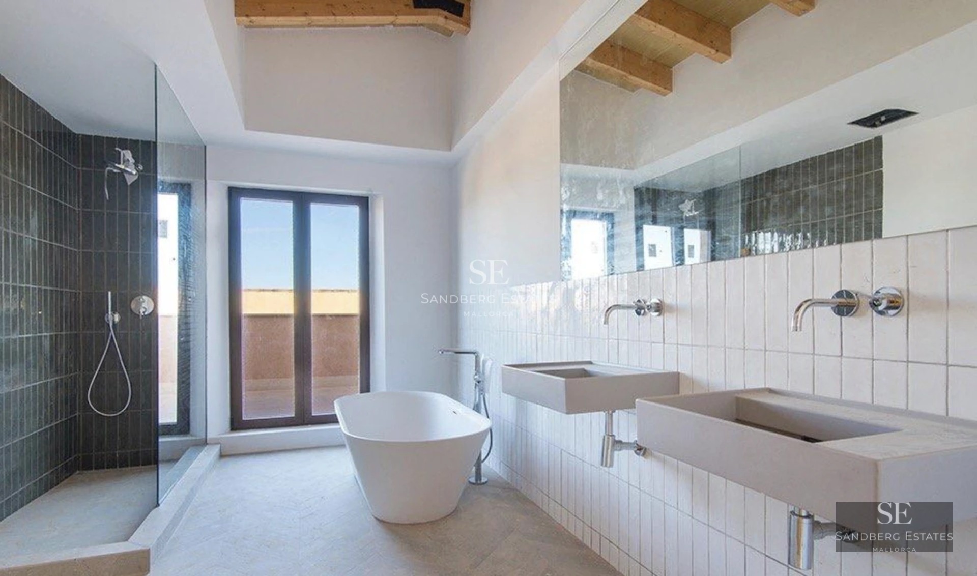 View of a swimming pool surrounded by lush vegetation. Modern house with large windows. Natural lighting and high-quality finishes.