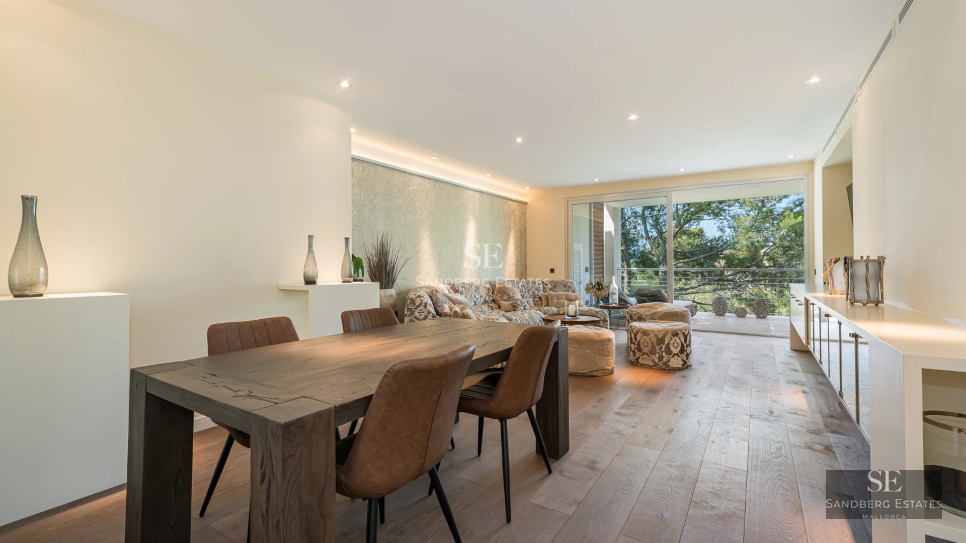 Spacious terrace with infinity pool and panoramic view. Modern architecture, sun loungers, and design details.