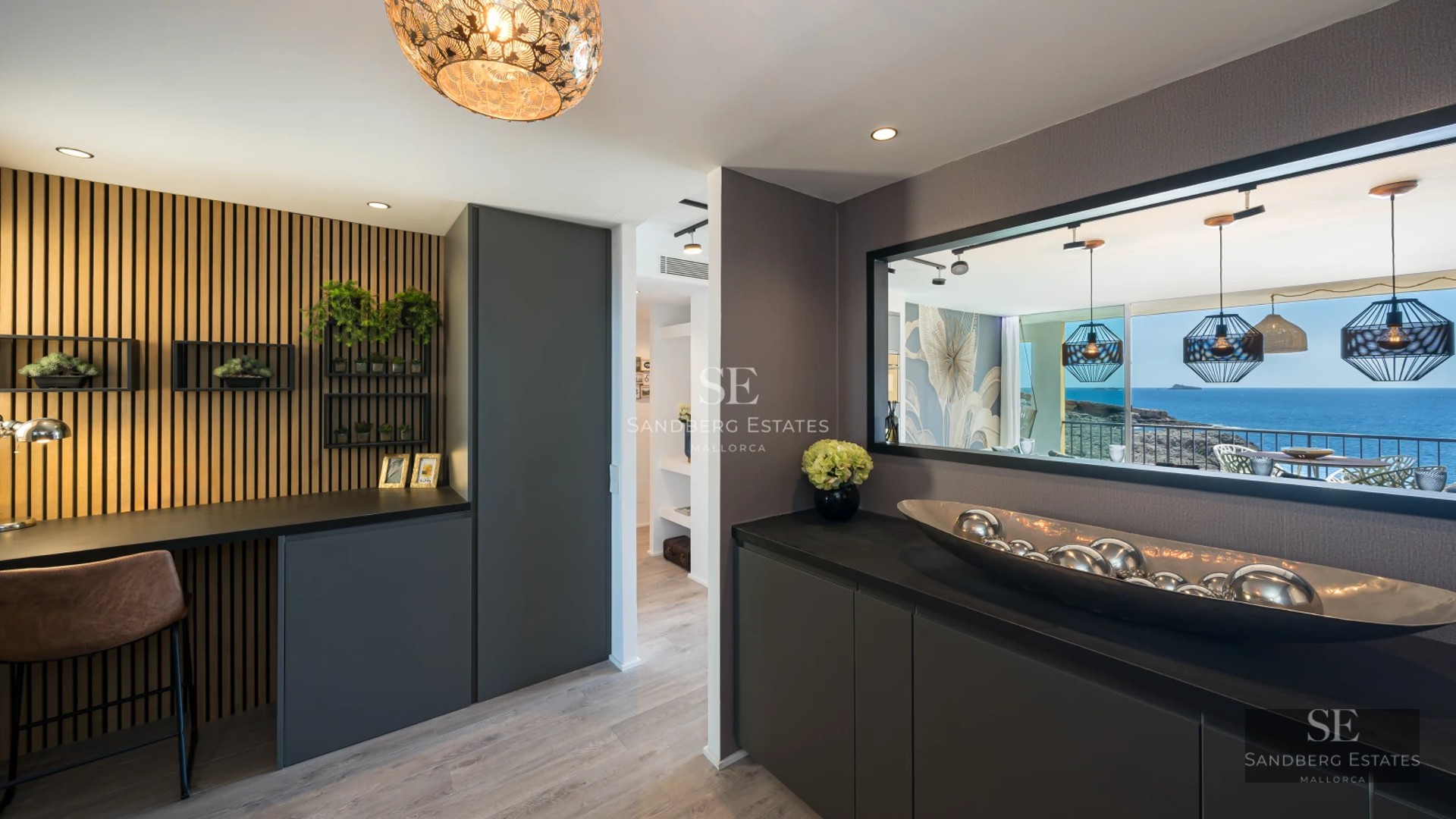 Spacious terrace with infinity pool and panoramic views. Modern design with glass windows and elegant outdoor furniture.