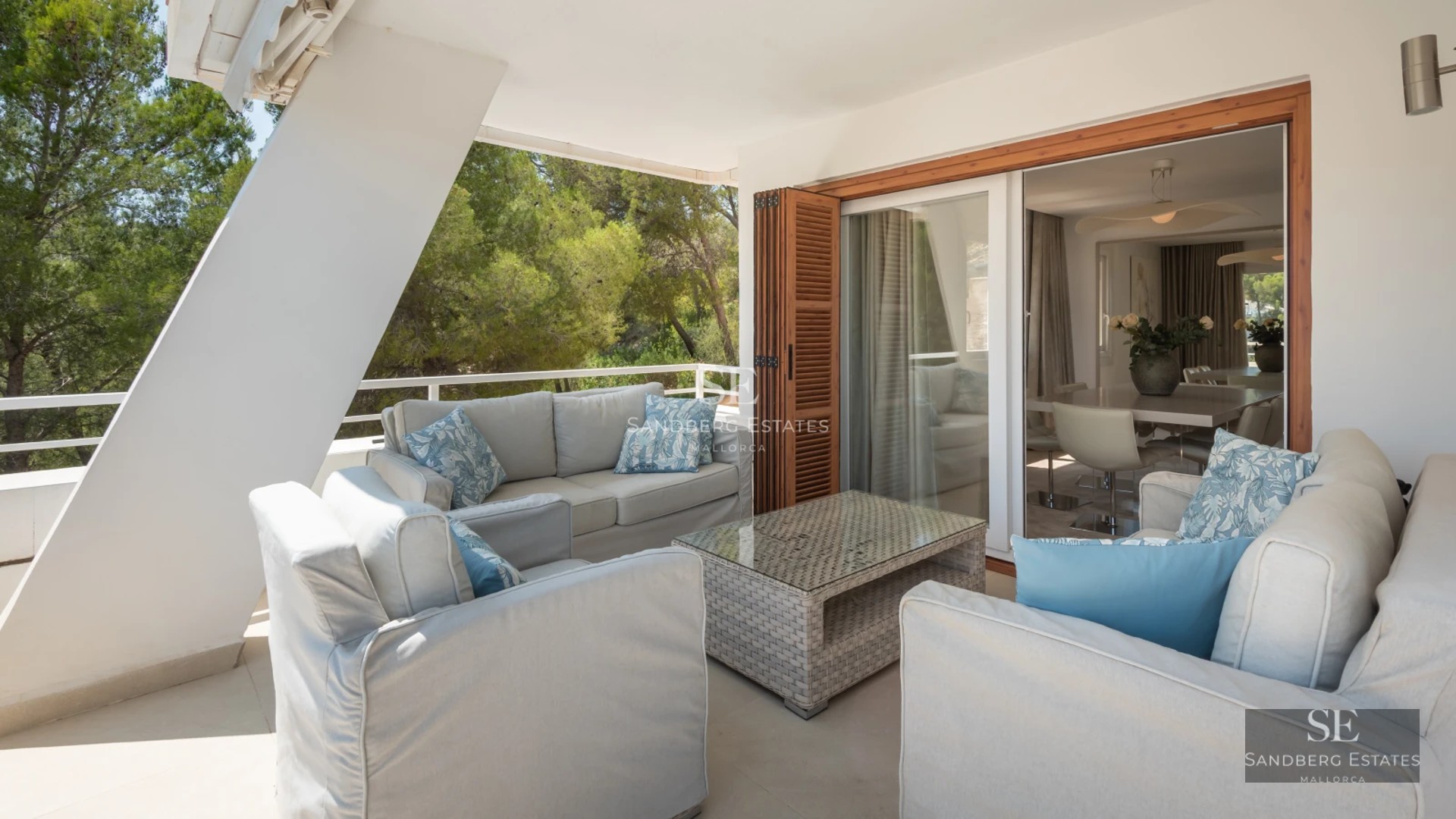Aerial view of modern home with infinity pool, lush garden, and minimalist architecture. Elegant and sophisticated design.