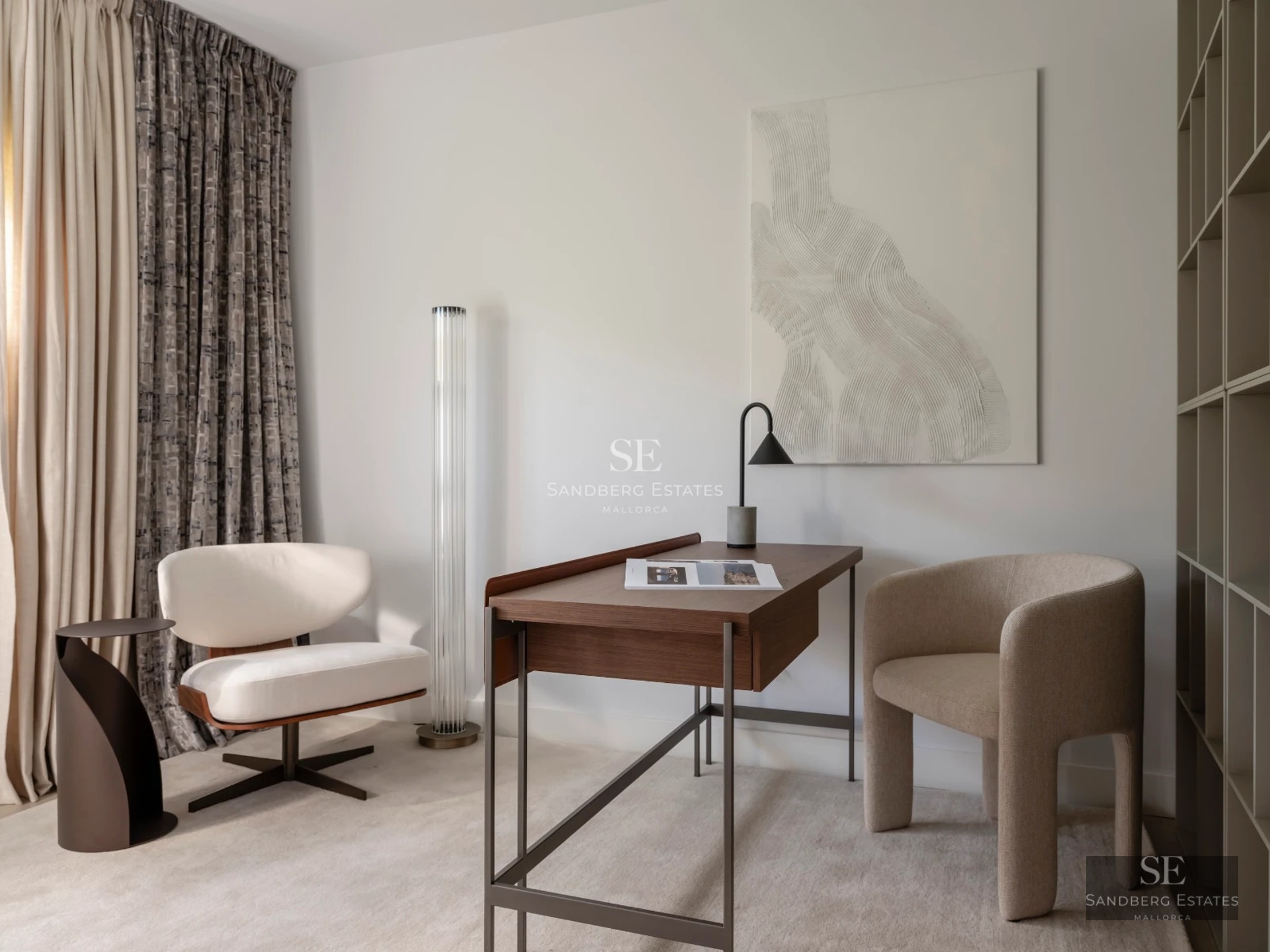 Bright living room featuring large windows, light wood floors and modern furniture. Breathtaking views. Elegant design.