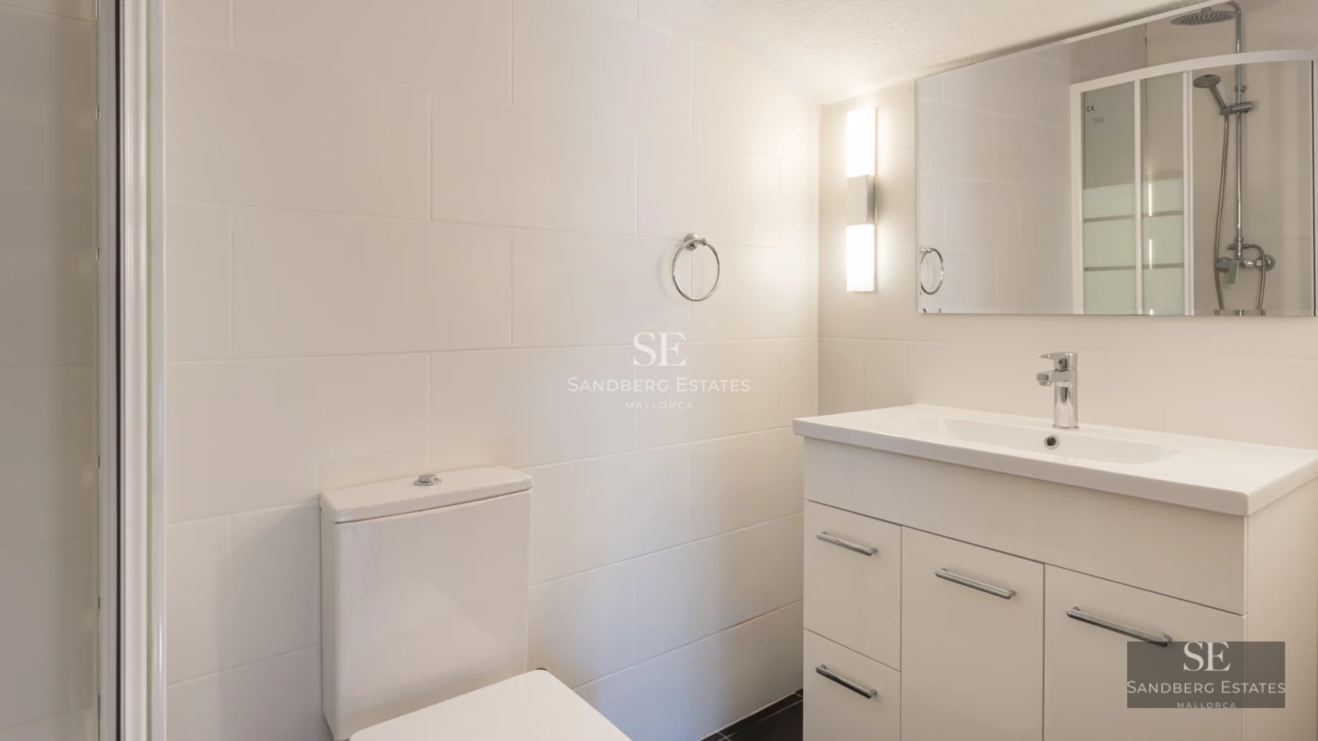 Exterior view of modern villa with reflecting pool, minimalist design, and expansive green spaces. Warm ambient lighting.