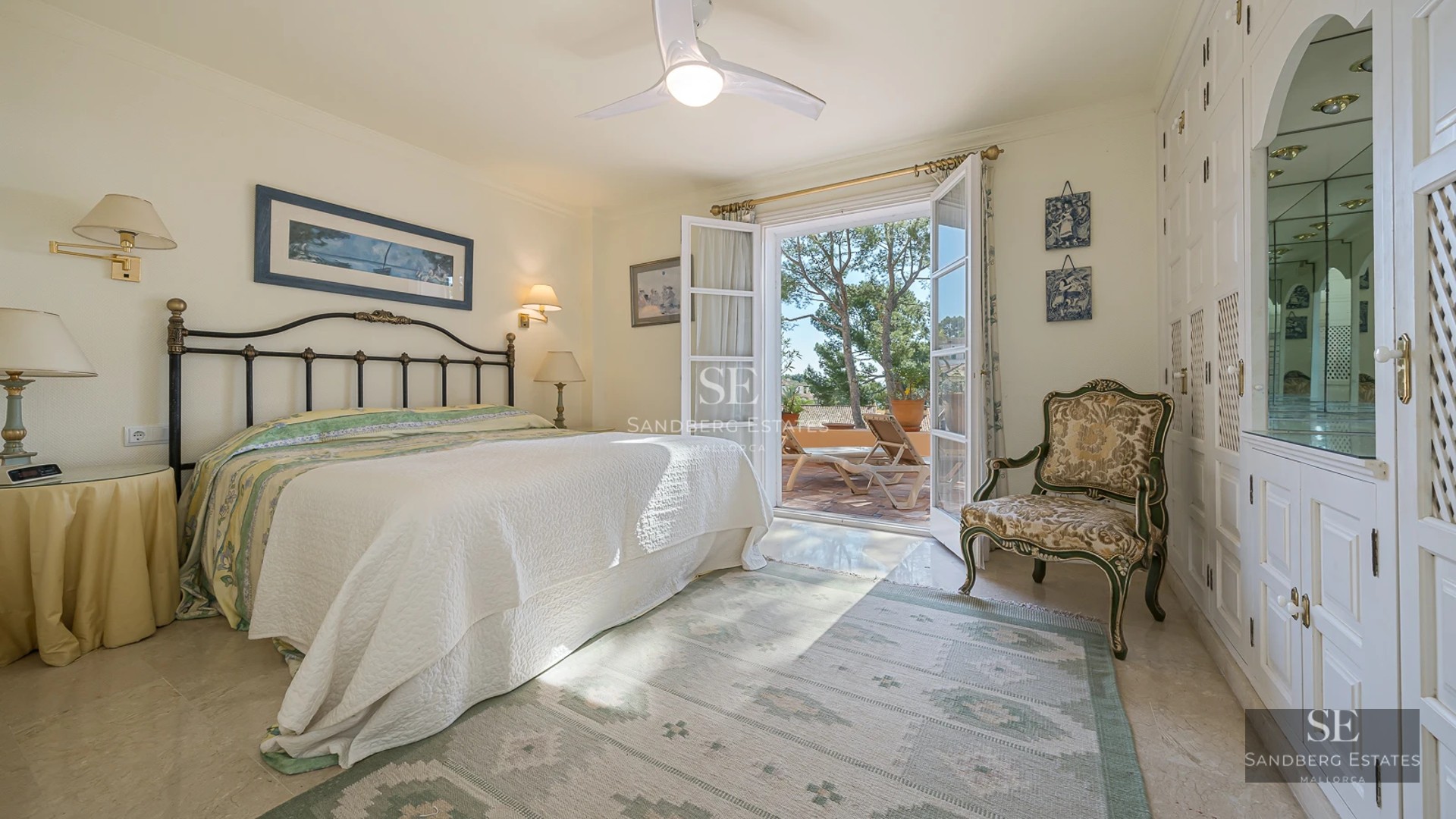 View of modern pool surrounded by lawn and minimalist architecture with large windows and wooden details.