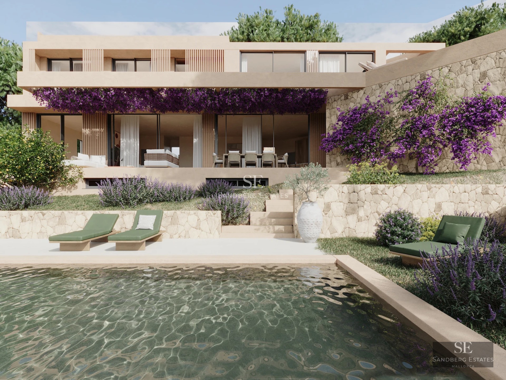 Spacious living room featuring large windows, modern sofas, and access to a terrace with views. Elegant and bright design.