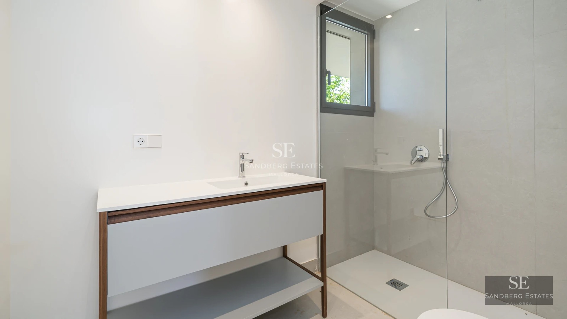 Exterior view of a modern villa with infinity pool, lush garden, and sleek architectural design. Spacious and bright living spaces.