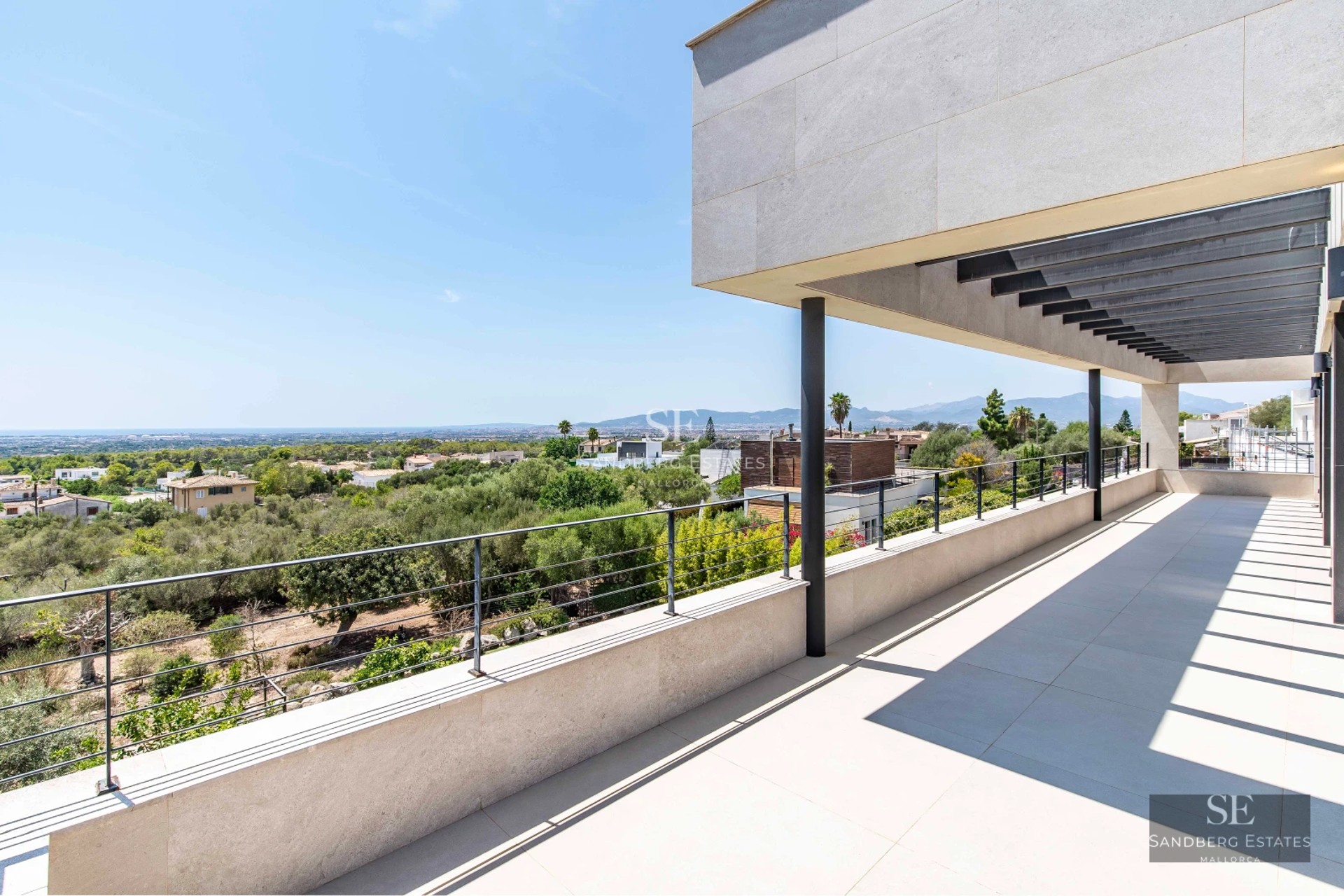 Exterior view of a modern villa with pool, terrace, and garden. Minimalist architecture featuring large windows and elegant design.